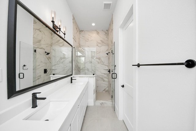 bathroom featuring visible vents, double vanity, recessed lighting, a sink, and a marble finish shower