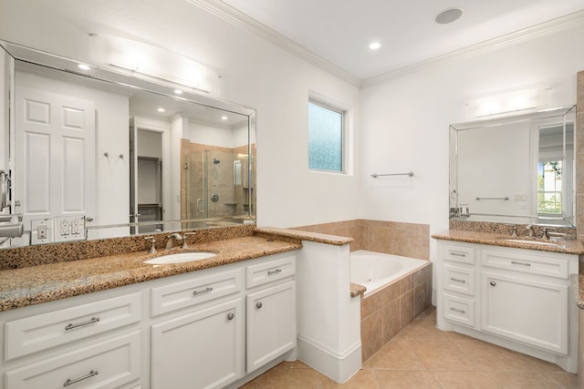 6115 Hamman St, Houston, TX 77007 - full bathroom with a shower stall, two vanities, crown molding, tile patterned flooring, and a garden tub
