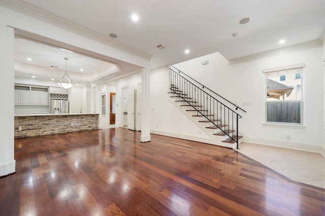 6115 Hamman St, Houston, TX 77007 - unfurnished living room with ornamental molding, stairs, wood finished floors, recessed lighting, and baseboards
