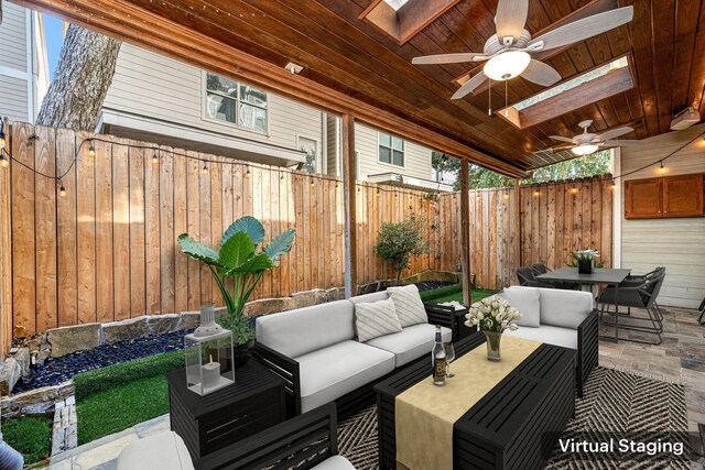 6115 Hamman St, Houston, TX 77007 - view of patio / terrace featuring an outdoor living space, a fenced backyard, a ceiling fan, and outdoor dining space