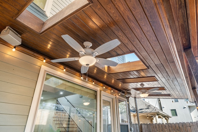 6115 Hamman St, Houston, TX 77007 - detailed view of a skylight, a ceiling fan, and fence