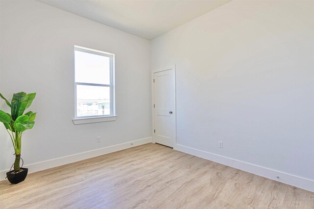 4206 Mason Dr, Galveston, TX 77554 - empty room featuring light wood-type flooring and baseboards