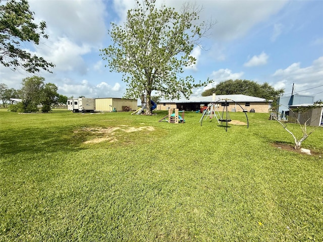 view of yard featuring a playground