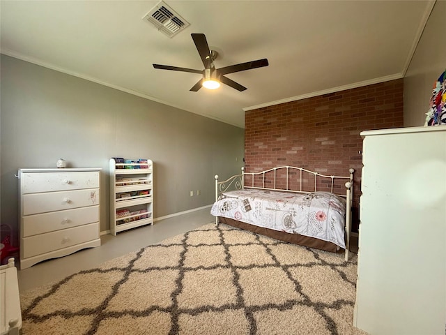 carpeted bedroom featuring visible vents, ornamental molding, baseboards, and a ceiling fan