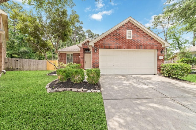 view of front facade with fence, a front yard, brick siding, concrete driveway, and an attached garage