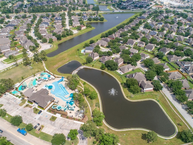 aerial view featuring a water view and a residential view