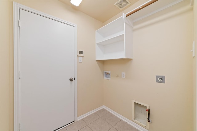laundry area with hookup for an electric dryer, laundry area, visible vents, hookup for a washing machine, and light tile patterned flooring