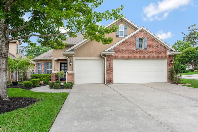 11068 First Lgt, Montgomery, TX 77356 - traditional-style home with driveway, brick siding, fence, an attached garage, and stucco siding
