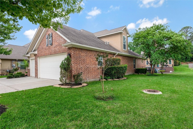 11068 First Lgt, Montgomery, TX 77356 - view of side of home with driveway, roof with shingles, stucco siding, brick siding, and a yard