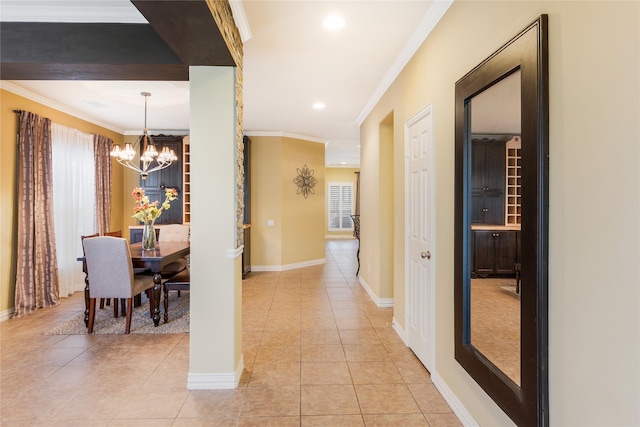 11068 First Lgt, Montgomery, TX 77356 - corridor with an inviting chandelier, ornamental molding, light tile patterned floors, and a wealth of natural light