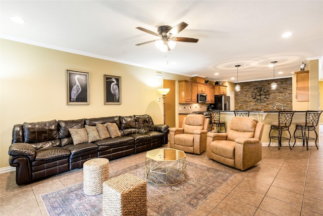 11068 First Lgt, Montgomery, TX 77356 - living area featuring crown molding, light tile patterned flooring, a ceiling fan, recessed lighting, and baseboards