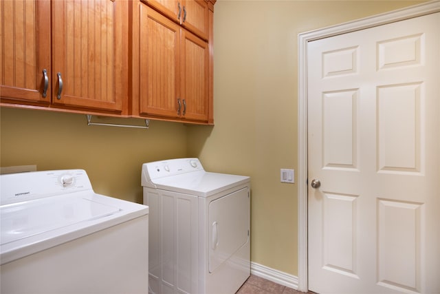 11068 First Lgt, Montgomery, TX 77356 - laundry room with cabinet space, separate washer and dryer, baseboards, and light tile patterned flooring