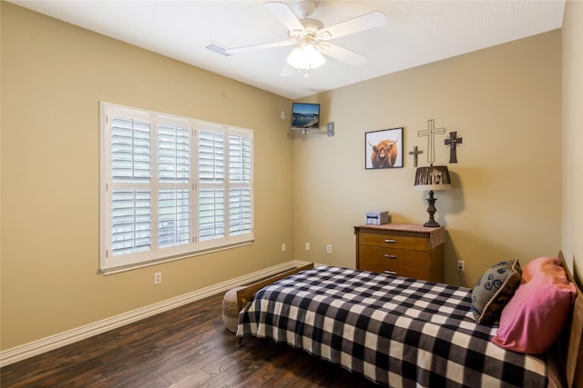 11068 First Lgt, Montgomery, TX 77356 - bedroom featuring baseboards, a ceiling fan, wood finished floors, and visible vents