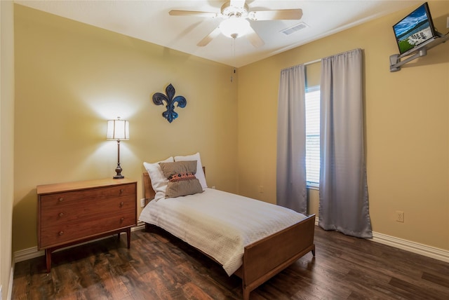 11068 First Lgt, Montgomery, TX 77356 - bedroom with baseboards, visible vents, multiple windows, and wood finished floors