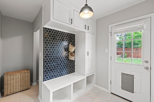 mudroom featuring baseboards