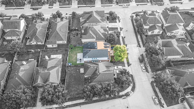birds eye view of property with a residential view