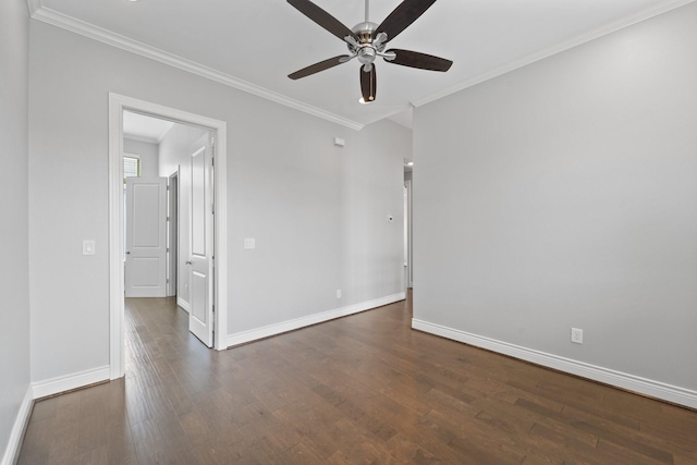 empty room with baseboards, a ceiling fan, wood finished floors, and ornamental molding