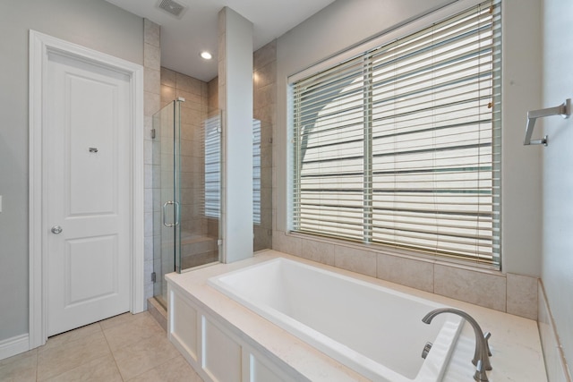 full bath with a bath, visible vents, tile patterned flooring, and a stall shower