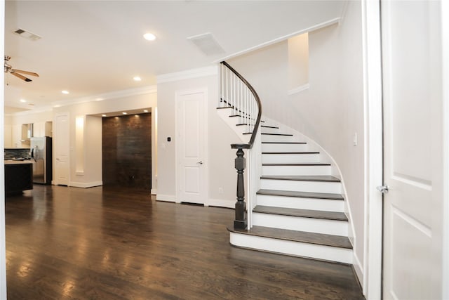 staircase featuring visible vents, ornamental molding, ceiling fan, and recessed lighting