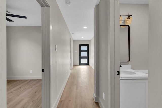 6014 W 43rd St, Houston, TX 77092 - hallway with light wood-style floors and recessed lighting