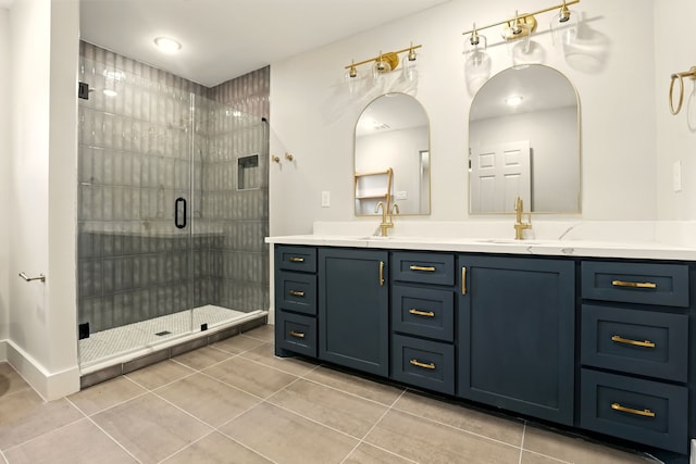 6014 W 43rd St, Houston, TX 77092 - bathroom featuring double vanity, a stall shower, and tile patterned flooring