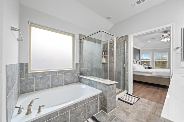 ensuite bathroom featuring ceiling fan, ensuite bath, a shower stall, visible vents, and a garden tub