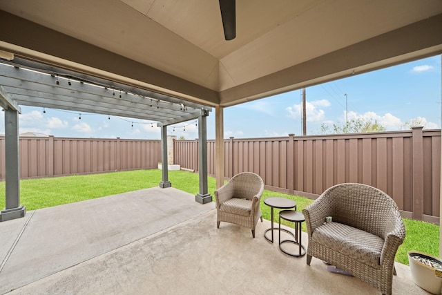 view of patio / terrace with a fenced backyard and a pergola