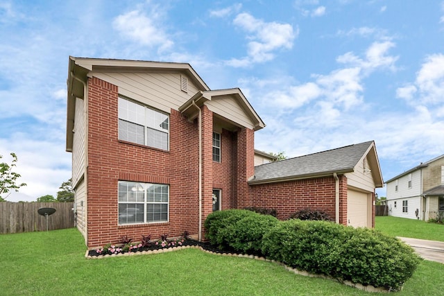 15519 Hensen Creek Dr, Houston, TX 77086 - traditional home featuring brick siding and an attached garage