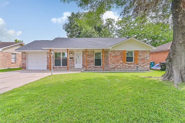 single story home featuring a garage, a front yard, roof with shingles, brick siding, and concrete driveway
