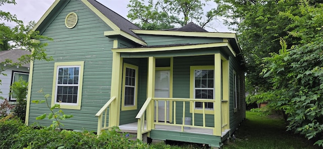 1426 E 36th St, Houston, TX 77022 - back of house with a shingled roof