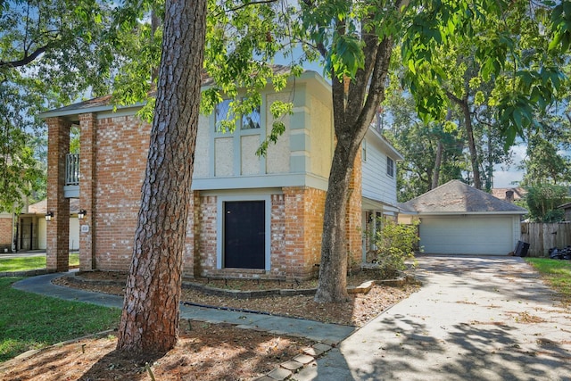 6531 Coral Ridge Rd, Houston, TX 77069 - view of front of home with brick siding, a garage, and fence