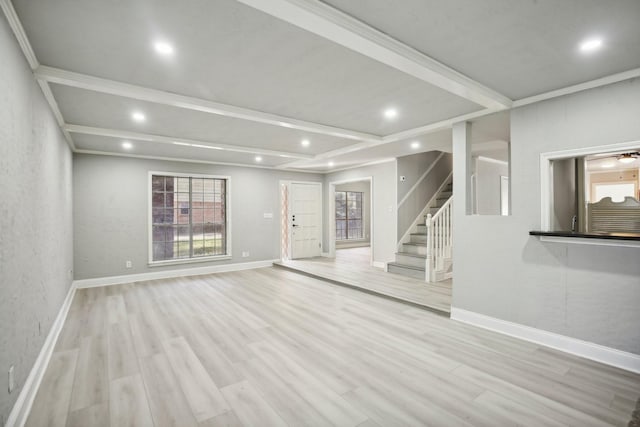 6531 Coral Ridge Rd, Houston, TX 77069 - unfurnished living room with recessed lighting, baseboards, stairs, and wood finished floors
