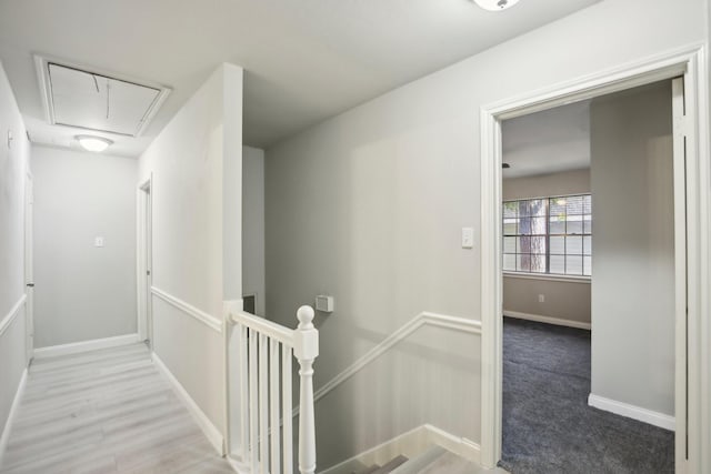 6531 Coral Ridge Rd, Houston, TX 77069 - hall featuring baseboards, an upstairs landing, and attic access