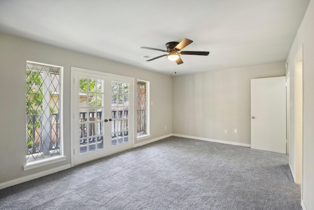 6531 Coral Ridge Rd, Houston, TX 77069 - empty room featuring plenty of natural light, a ceiling fan, carpet floors, and visible vents