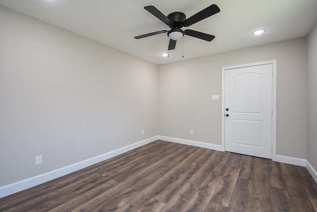 empty room with recessed lighting, baseboards, dark wood-style floors, and a ceiling fan