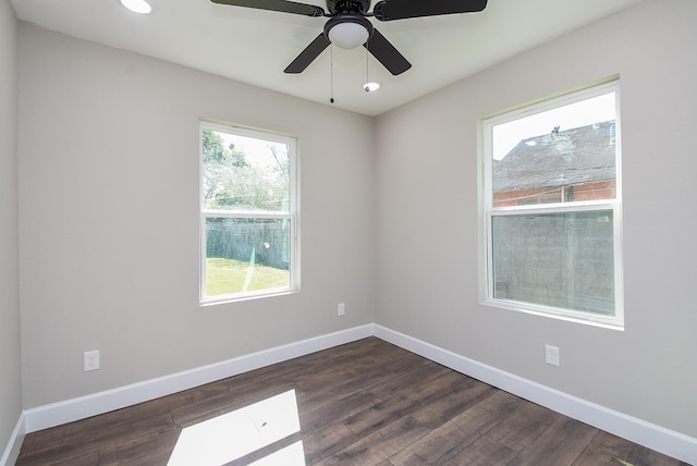 unfurnished room with recessed lighting, baseboards, a ceiling fan, and dark wood-type flooring