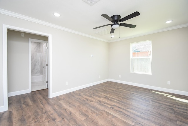 spare room with a ceiling fan, baseboards, visible vents, and ornamental molding