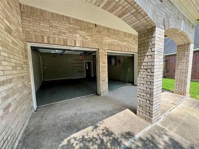 garage featuring driveway
