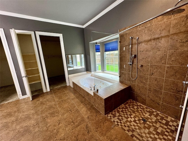 full bath featuring crown molding, tile patterned flooring, a garden tub, a walk in closet, and a tile shower