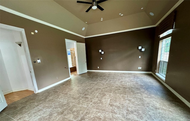 tiled spare room with baseboards, ceiling fan, and high vaulted ceiling