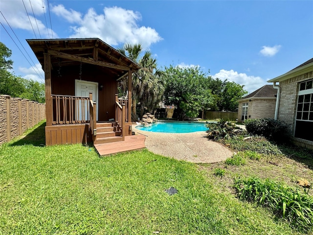 view of swimming pool with a fenced in pool, a yard, and a fenced backyard