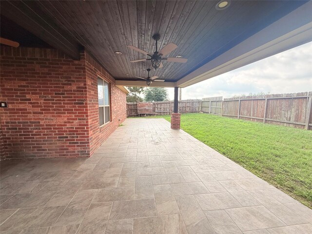 view of patio with ceiling fan and a fenced backyard