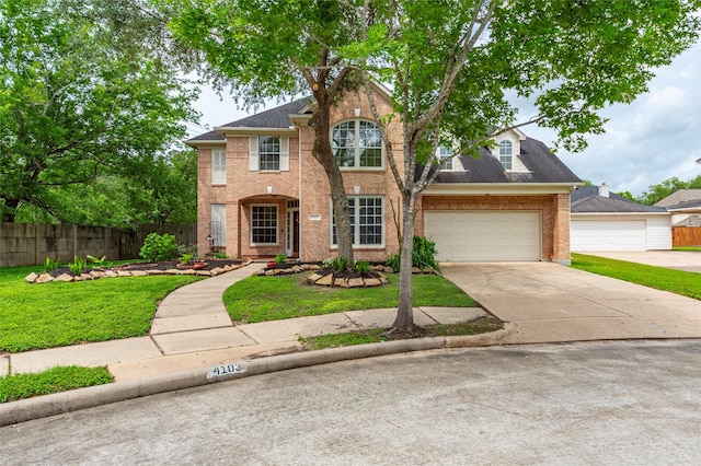 4103 Oak Blossom Ct, Houston, TX 77059 - view of front of home with brick siding, fence, and a front lawn