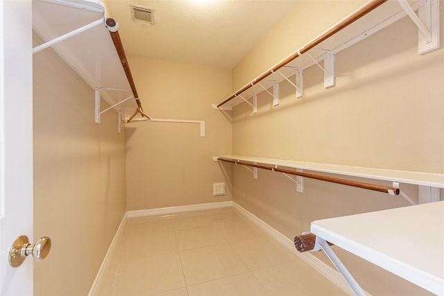 4103 Oak Blossom Ct, Houston, TX 77059 - walk in closet featuring tile patterned floors and visible vents