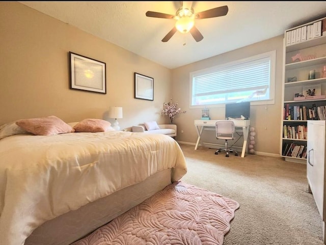 11303 Olympia Dr, Houston, TX 77077 - carpeted bedroom with a ceiling fan and baseboards
