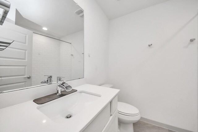 bathroom featuring tile patterned flooring, walk in shower, vanity, toilet, and recessed lighting