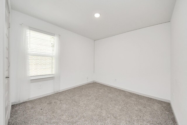 unfurnished living room with visible vents, recessed lighting, a ceiling fan, light wood finished floors, and vaulted ceiling