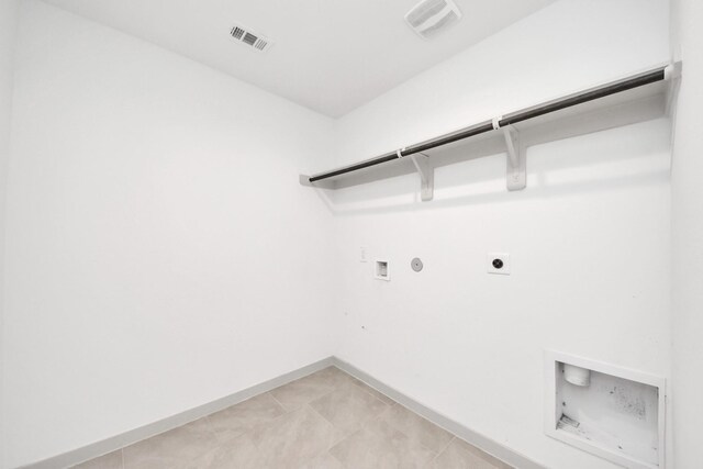 laundry area featuring gas dryer hookup, washer hookup, hookup for an electric dryer, laundry area, and visible vents