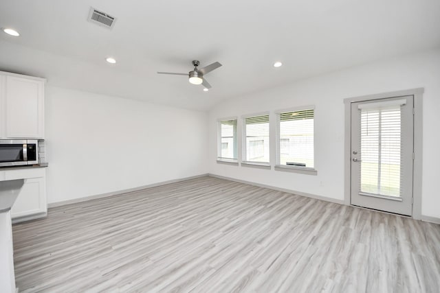 unfurnished living room featuring recessed lighting, ceiling fan, visible vents, and light wood finished floors