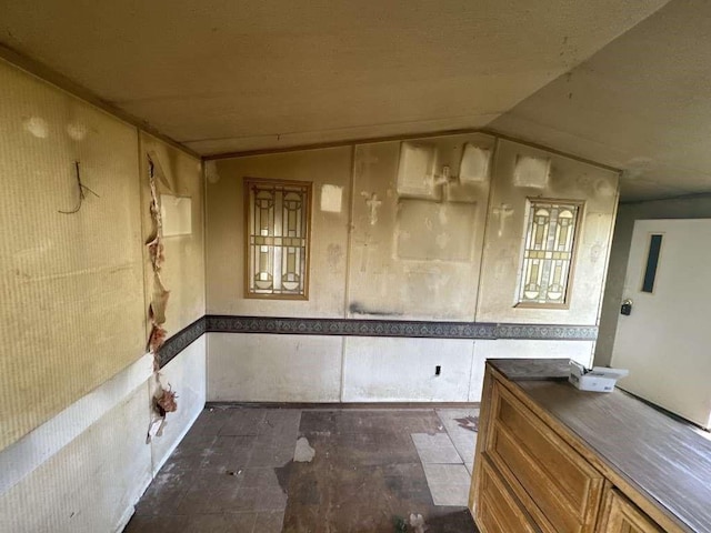 bathroom with lofted ceiling